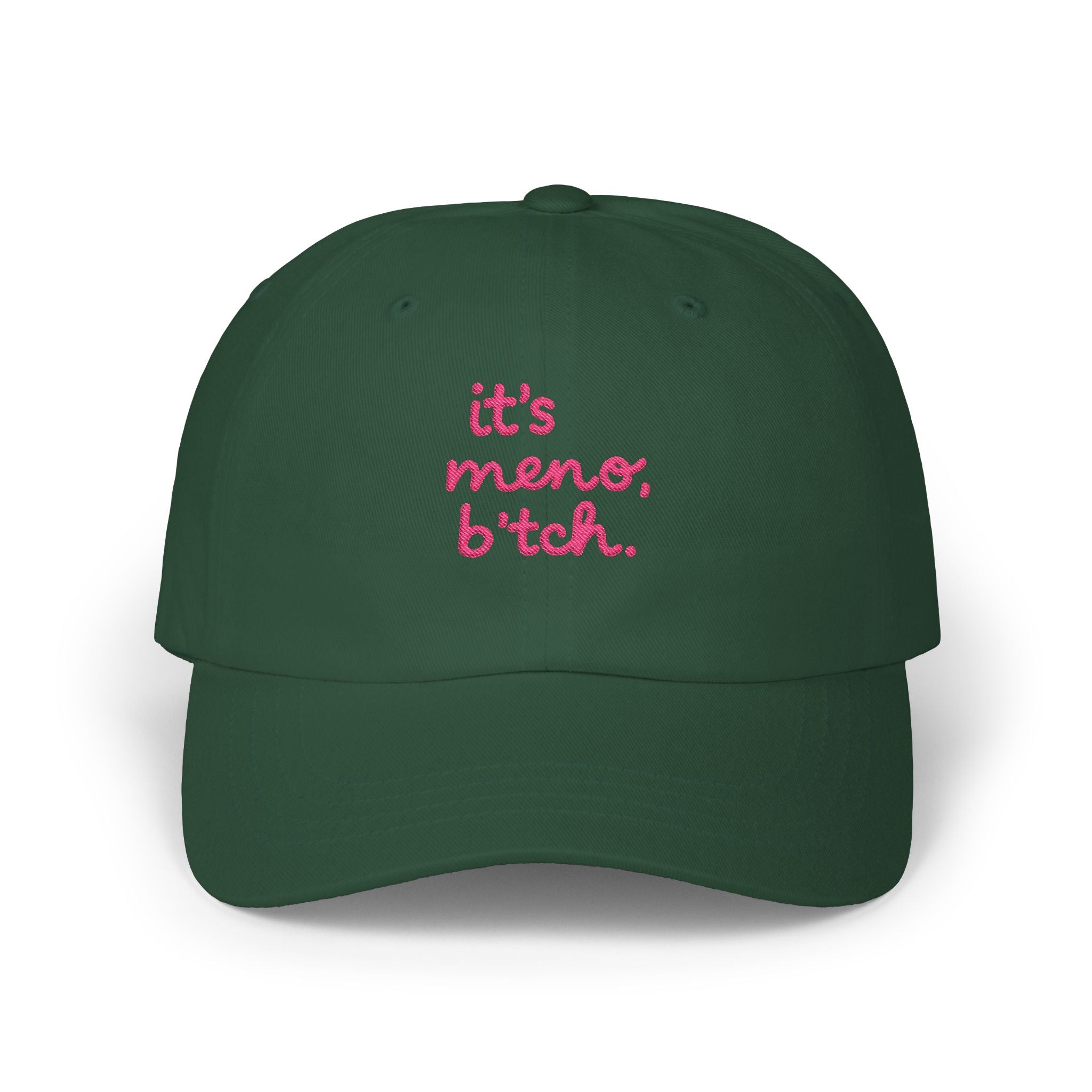 Green baseball cap, pink embroidered it's meno b*tch text 